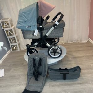 Bugaboo Donkey 3 in soft pink and blue with pram tastic background